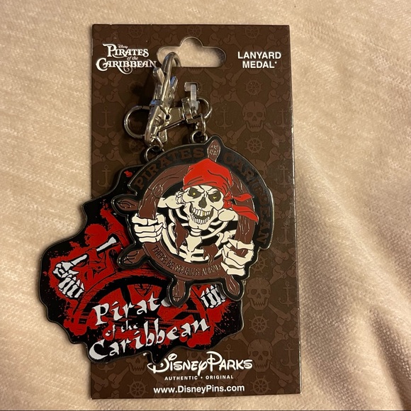DISNEY PARKS PIRATES OF THE CARIBBEAN SKELETON METAL LANYARD SET OF 2 - Picture 1 of 2